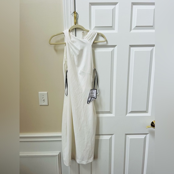 RACHEL Rachel Roy Dresses & Skirts - Nwt gorgeous Rachel Roy size medium white stretchy lined dress